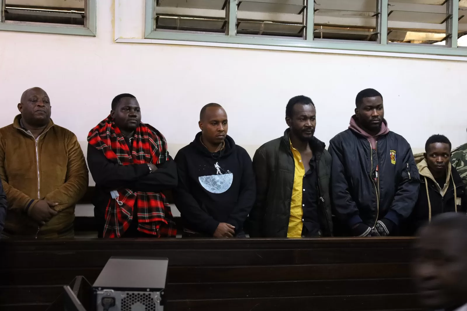 Nairobi Central Police Station OCS Samson Kiprotich Taalam, Police Constable James Mukhwana, and Officer Peter Kimani as well as three civilians: John Ngige Gitau, Gin Ammitou Abwao, and Brian Mwaniki Njue.