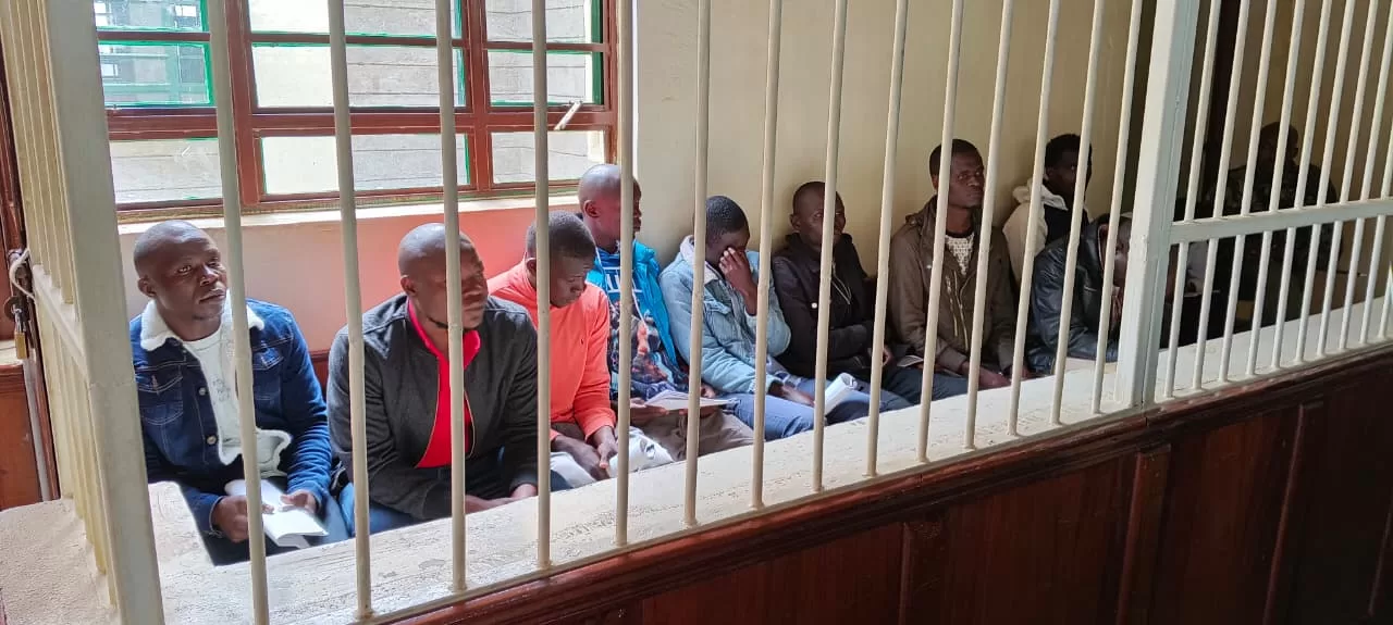 Photo of Kennedy Oluoch, Nicholus Otieno, Tofiq Owiti Mohammed, Michael Omondi Opiyo, David Bill Clinton Otieno, Samuel Ouma, Robert Ouko Abala, and Erick Obunga Osumba in Court