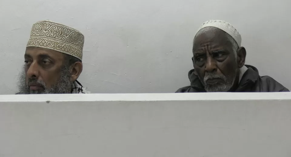 Photo of Feiswal Mohamed Ali (L) and Mohammed Hassan Kontoma (R) in Court