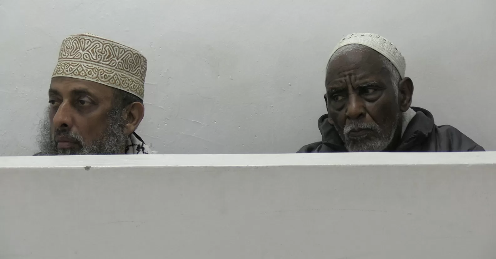 Photo of Feiswal Mohamed Ali (L) and Mohammed Hassan Kontoma (R) in Court