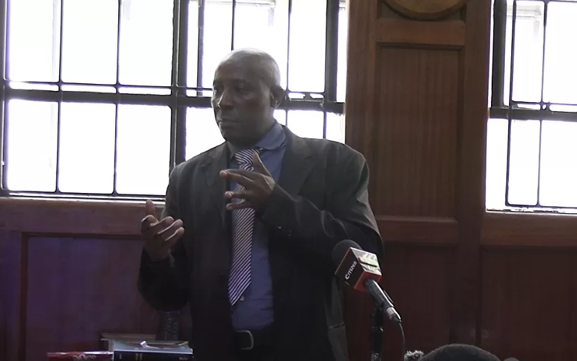 Photo of Superintendent of Police and firearms examiner Alex Mdindi Mwandawiro in court