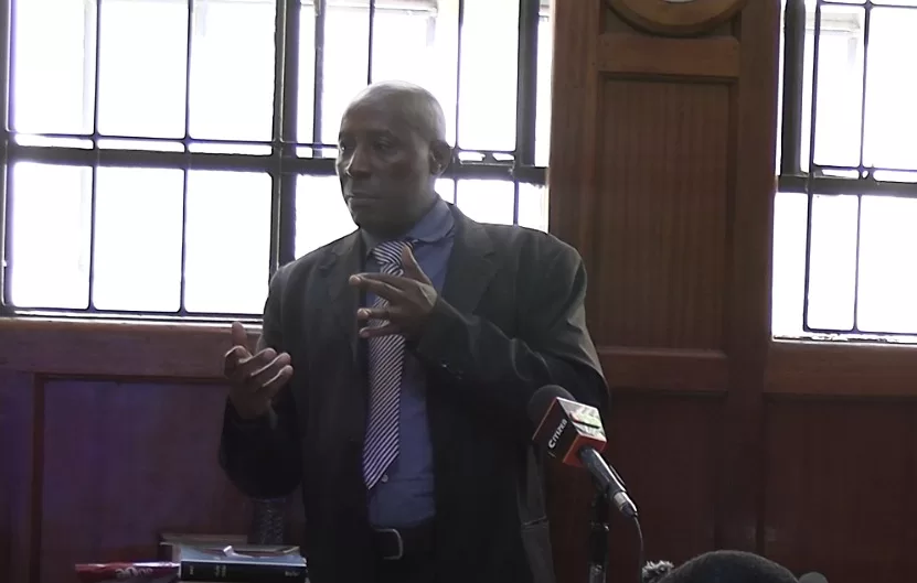 Photo of Superintendent of Police and firearms examiner Alex Mdindi Mwandawiro in court