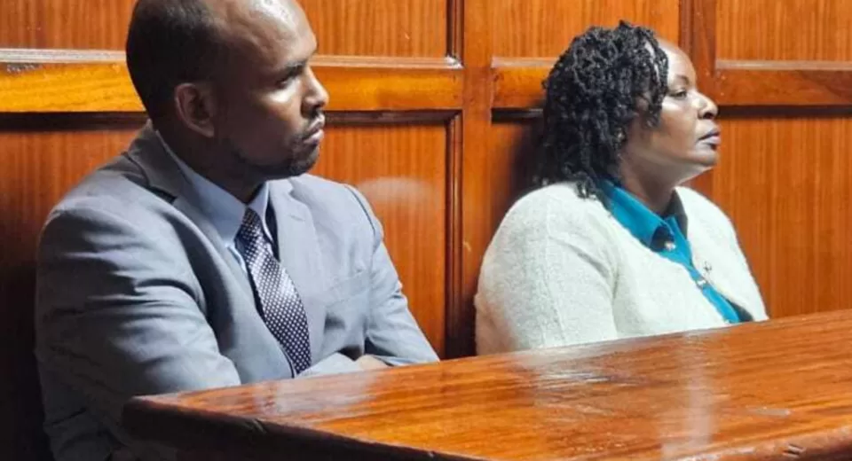 Photo of former Eastleigh North Police Station officer Rebeccah Njeri Muraya (R) and her colleague, Sergeant Abdisalam Ahmed (L) in court