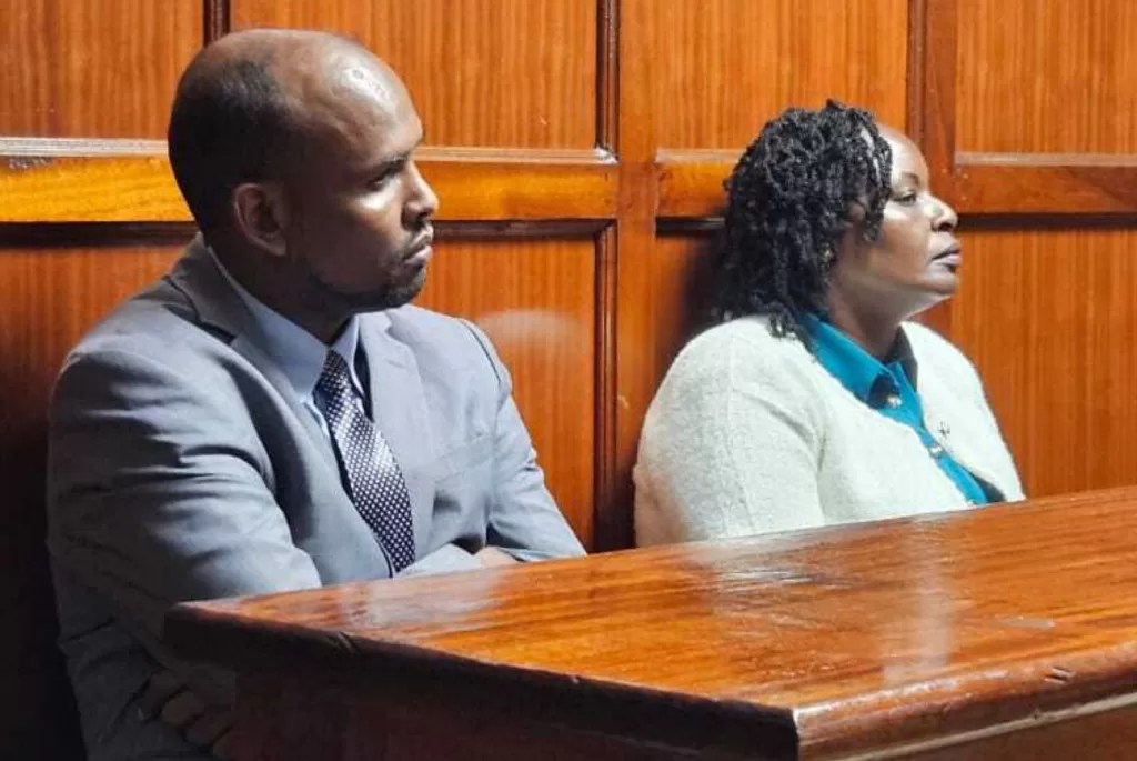 Photo of former Eastleigh North Police Station officer Rebeccah Njeri Muraya (R) and her colleague, Sergeant Abdisalam Ahmed (L) in court