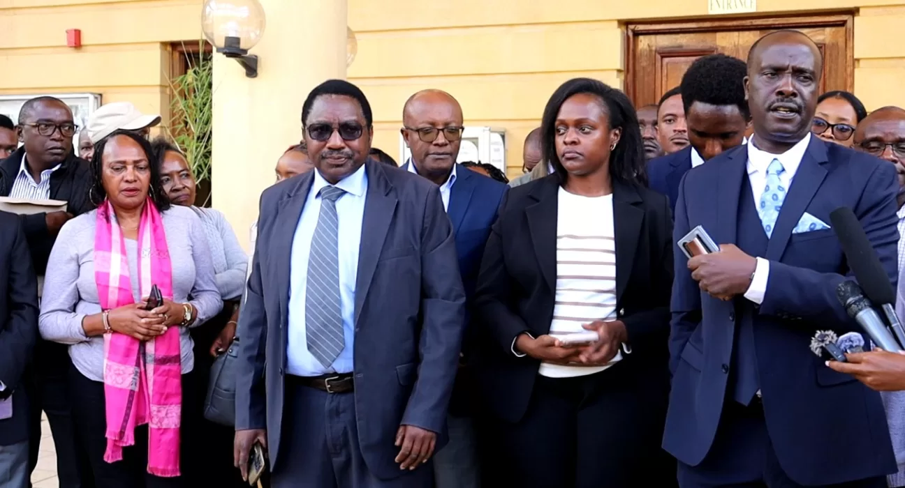 Retired Standard Chartered Bank Staff And Their Lawyers At Milimani Law Court