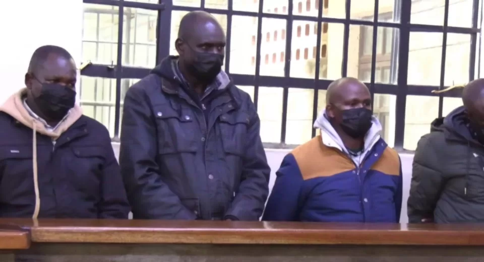 Photo of officers; Jim Muriithi, Emmanuel Sang, Antony Wang’ombe, and Joshua Keter in court