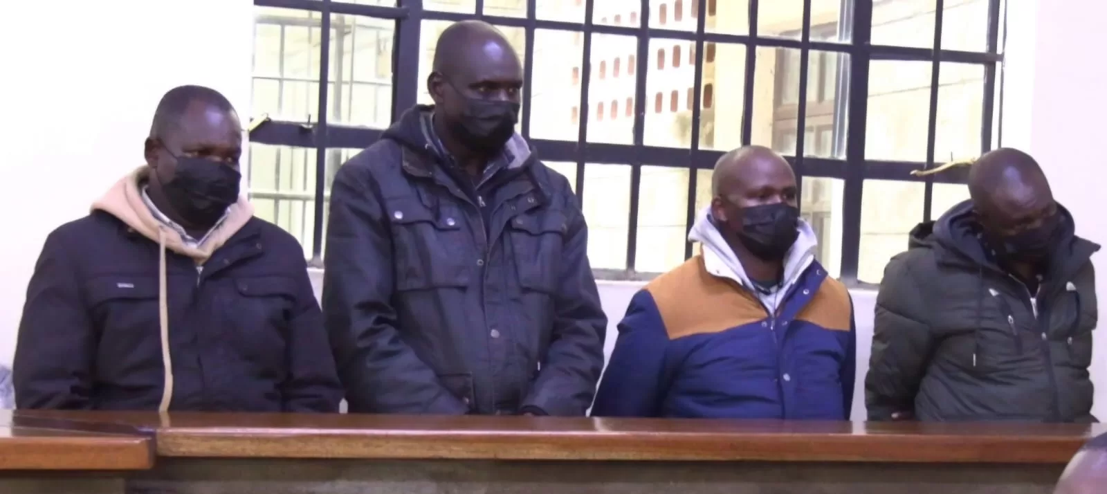 Photo of officers; Jim Muriithi, Emmanuel Sang, Antony Wang’ombe, and Joshua Keter in court