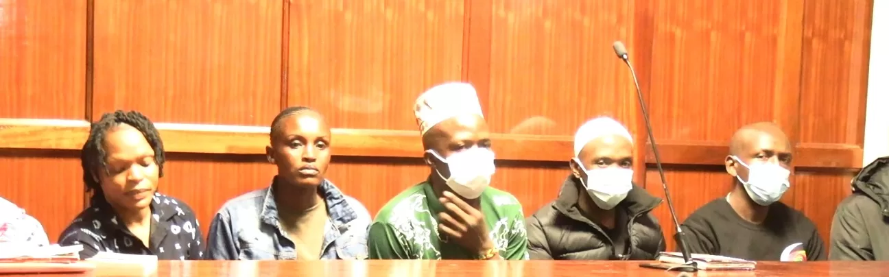 Photo of Erick Muyera, Raphael Kimani, Mustapha Kimani, Stephen Astiva, Jane Wanjiru, Margaret Njeri and Simon Wambugu in Court