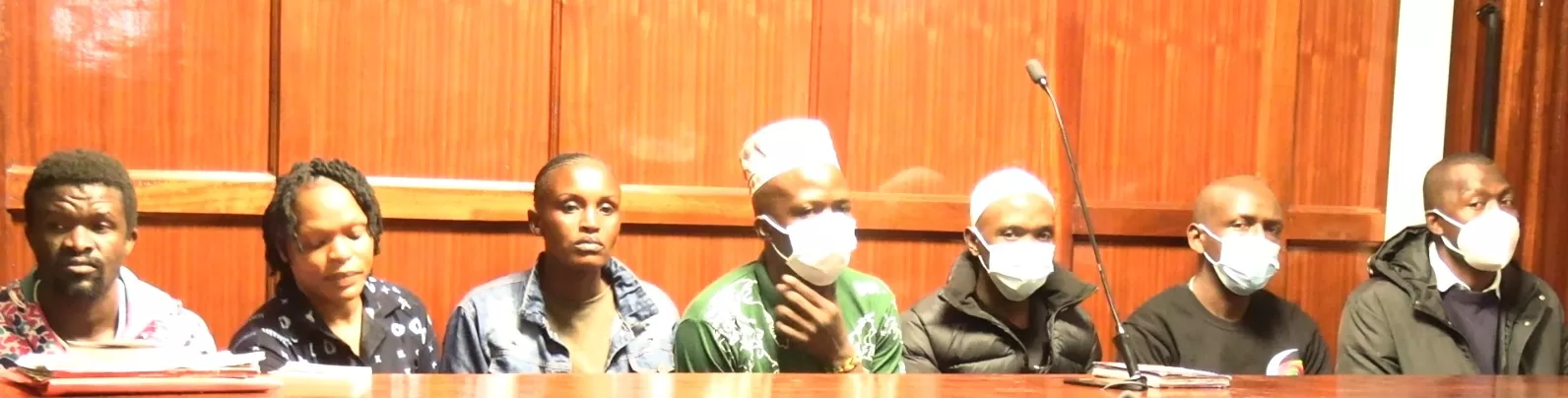 Photo of Erick Muyera, Raphael Kimani, Mustapha Kimani, Stephen Astiva, Jane Wanjiru, Margaret Njeri and Simon Wambugu in Court