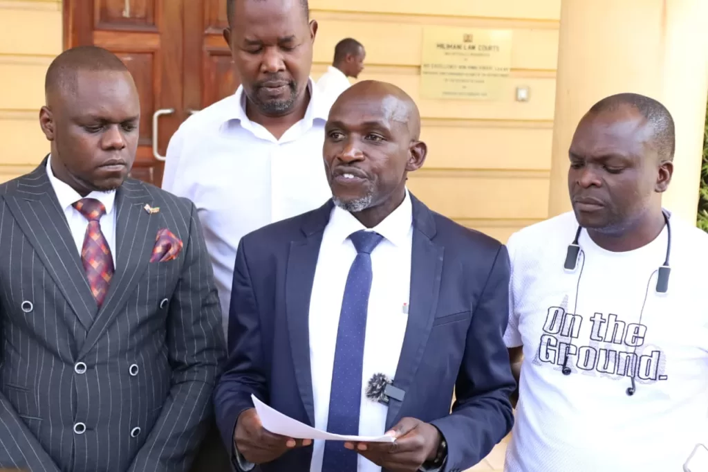 Tony Gachoka and Fredrick Onyango Ogola outside Milimani Law Courts